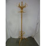 A bentwood hat and coat stand of customary form