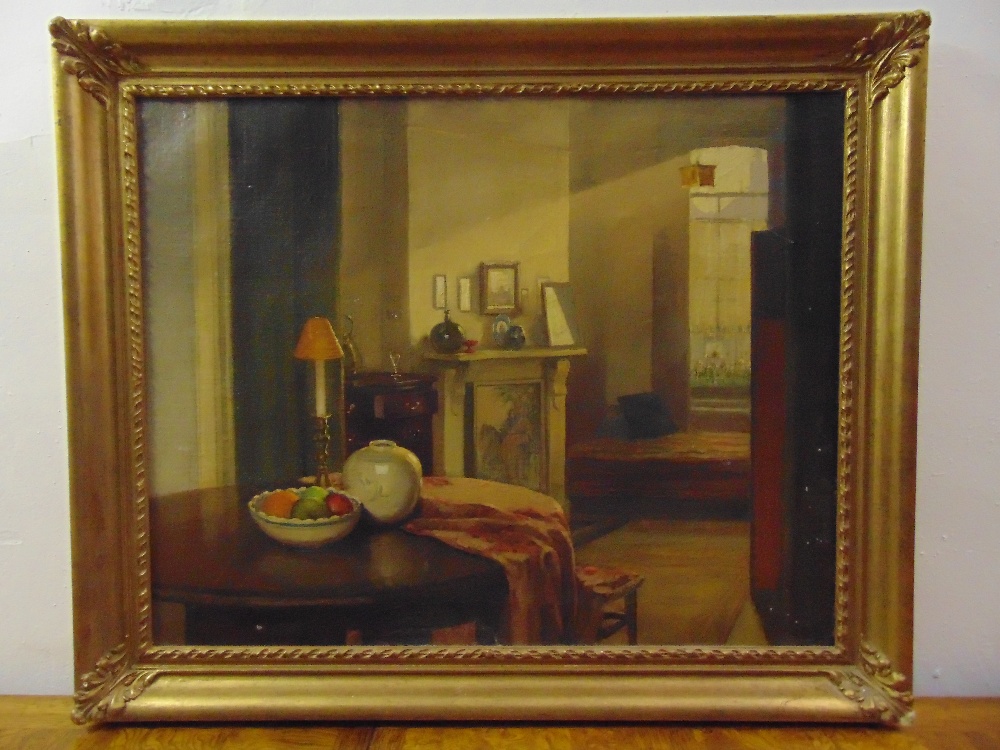 A framed oil on canvas of an interior scene, 61 x 76cm