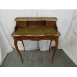 A Louis XVI style rectangular desk with gallery shelf, on four cabriole legs