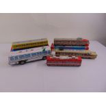 A quantity of tin plate coaches and buses, two in original packaging (5)