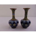 A pair of Doulton Lambeth baluster vases, marks to the base