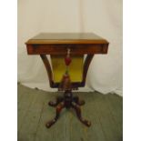 A Victorian rectangular sewing table with single drawer on four scroll legs