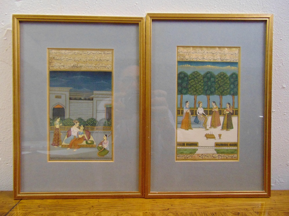 A pair of framed and glazed Indian watercolours of figures in landscapes, 19 x 11cm