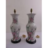 A pair of Chinese baluster form vases decorated with birds flowers and leaves converted to table