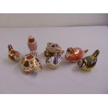 Seven Royal Crown Derby figurines to include five birds, a tortoise and a frog