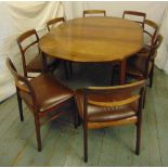 A Danish mid 20th century shaped oval rosewood dining table and eight matching dining chairs (
