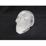 A carved rock crystal model of a skull