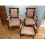 A pair of mahogany upholstered occasional chairs and a matching foot stool