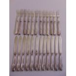 A set of twelve silver fish knives and forks, reeded handles, hallmarked blades, Sheffield 1971