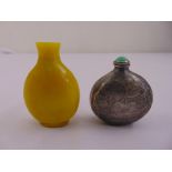 Two Chinese snuff bottles one with stopper missing