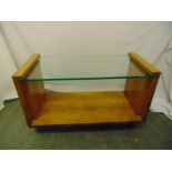 An Art Deco rectangular glass and satinwood coffee table