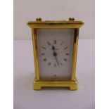 Bayard 8 day brass carriage clock of customary form with swing handle