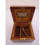 A Dunhill rectangular humidor with Cohiba and Monte Christo cigars