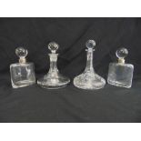 A pair of rectangular decanters with white metal collars and drop stoppers and two cut glass ships