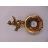 A gold plated half hunter pocket watch of customary form