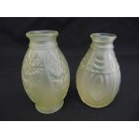 Two frosted glass pear shaped vases moulded with stylised decorations by Jama Montreuil