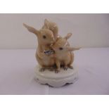Royal Copenhagen figurine of two squirrels 416 on circular raised plinth, marks to the base