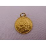 A Swiss 20 Franc gold coin 1935 with pendant loop