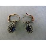 A pair of Victorian sapphire and diamond earrings set in white and yellow metal