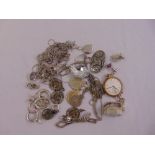 A quantity of silver and costume jewellery to include necklaces, earrings and watches