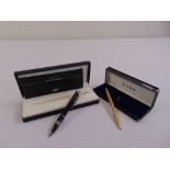 Mont Blanc ballpoint pen in fitted case and a Parker gold plated ballpoint pen