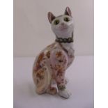 Galle signed ceramic figurine of a cat with green glass eyes, A/F