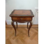 A French Louis XVI style rectangular side table with hinged top on cabriole legs