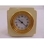 Cartier of Paris desk clock rectangular with incuse corners, white enamel dial, Roman numerals