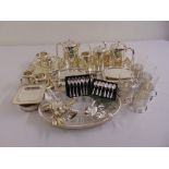 A quantity of silver plate to include entrée dish and cover, teasets, trays, tea glasses, hors d'