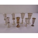 Eight hallmarked silver Kiddush cups of varying size and form