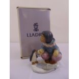 Lladro Eskimo girl with penguin 12259 in original fitted packaging