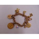 9ct yellow gold charm bracelet set with seven charms, a padlock and a 1918 sovereign, approx total