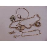 A quantity of costume jewellery to include necklaces, rings and earrings