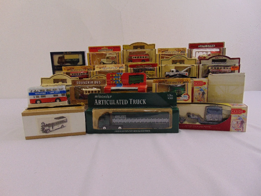 A quantity of diecast to include Lledo cars, trucks and buses all in original packaging (55)