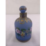 A frosted blue glass ovoid perfume bottle with drop stopper decorated with floral sprays and