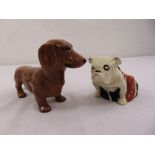 Royal Doulton Bulldog, marks to the base and a Beswick figurine of a Daschund