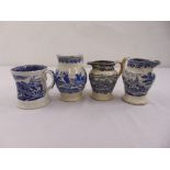 A quantity of blue and white porcelain depicting hunting scenes to include two jugs and two
