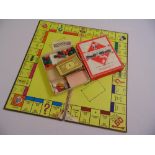 A vintage mid 20th century Monopoly set to include the game board, A/F