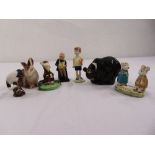 A quantity of figurines to include Doulton, Beswick and Poole (7)