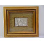 A framed and glazed white metal rectangular embossed panel of a girl by a pond COA to verso