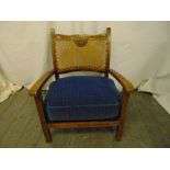 A mahogany childs chair with bergere back and upholstered seat on tapering rectangular legs