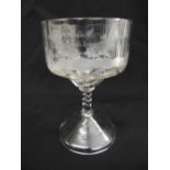 A late 19th century French glass on raised circular foot, the sides engraved with cockerels