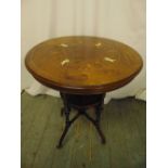 An Edwardian circular occasional table inlaid with satinwood and bone, on cabriole legs