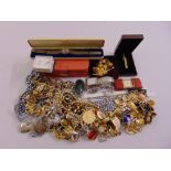 A quantity of costume jewellery to include earrings, rings, necklaces, bracelets, cufflinks and