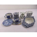 A quantity of blue and white porcelain to include an invalids cup, spittoon cups and a chamber