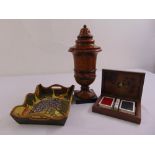 A turned wooden Acanto vase and cover, playing card box with hinged cover to include playing cards