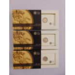 Three half sovereign gold coins in fitted cases dated 2011