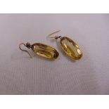 A pair of 9ct gold and citrine earrings