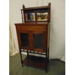 An Edwardian rectangular mahogany hall cabinet with mirrored back and glazed hinged doors A/F