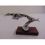 Chromed car mascot in the form a stylised leaping greyhound for Delage on rectangular plinth